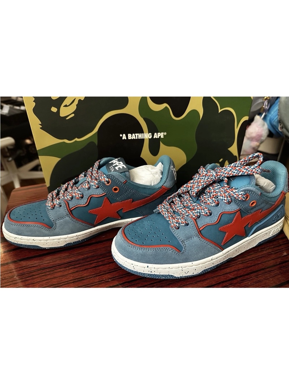 A Bathing Ape Bapesta Low Sneakers in Denim Blue with Red Star